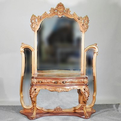 Lot 125 - A continental style mirrored dressing table,...