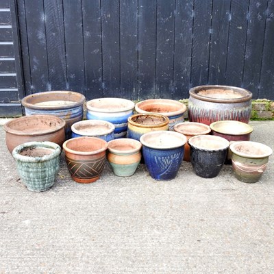 Lot 366 - A large collection of glazed garden pots