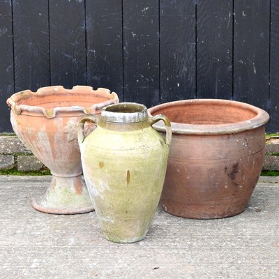 Lot 545 - A large terracotta garden pot, 44cm high,...