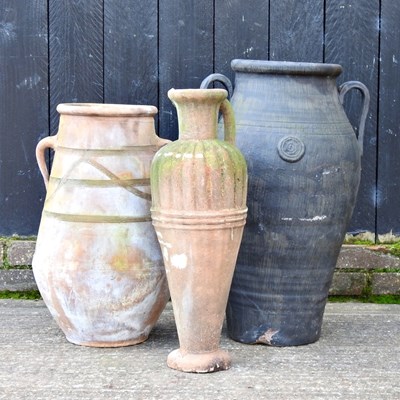 Lot 358 - An amphora garden pot, together with two...