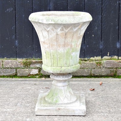 Lot 33 - A cast stone garden urn, of pedestal form,...