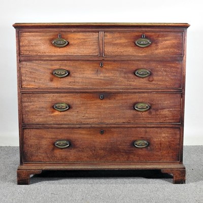 Lot 584 - A George III mahogany chest of drawers, on...