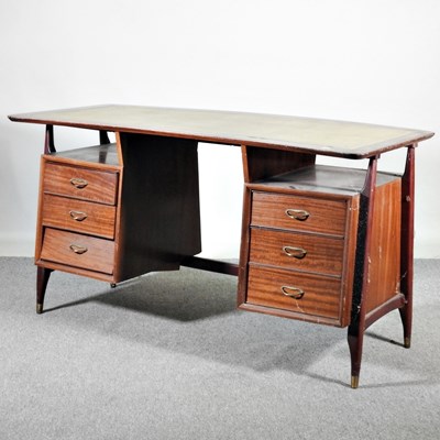 Lot 127 - A 1960's teak and ebonised floating banana desk