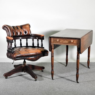 Lot 216 - A leather upholstered revolving desk chair,...