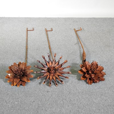 Lot 450 - Three rusted flower head plant supports, 150cm...