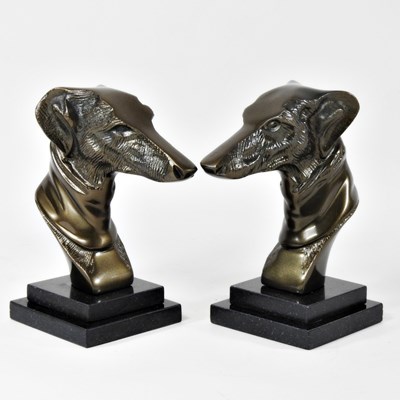 Lot 373 - A pair of bronzed greyhound portrait heads,...