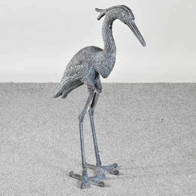 Lot 366 - A cast metal garden sculpture of a heron, 69cm...