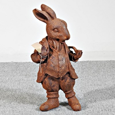 Lot 258 - A rusted metal garden sculpture of Mr Rabbit,...