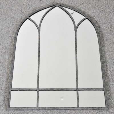 Lot 399 - A small Gothic style garden mirror