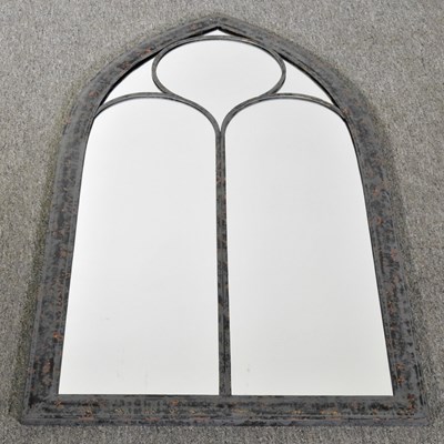 Lot 357 - A pointed arched metal garden mirror, 113 x...