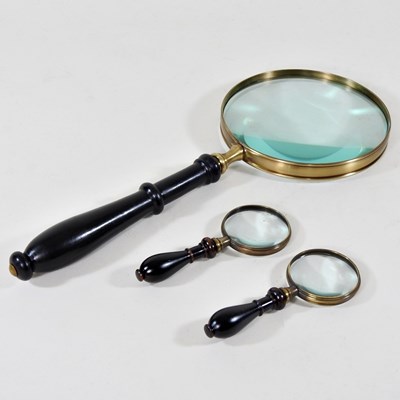 Lot 327 - A large table magnifying glass, together with...