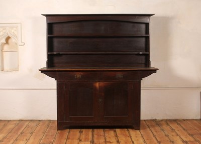 Lot 283 - A Liberty & Co Arts and Crafts oak dresser,...