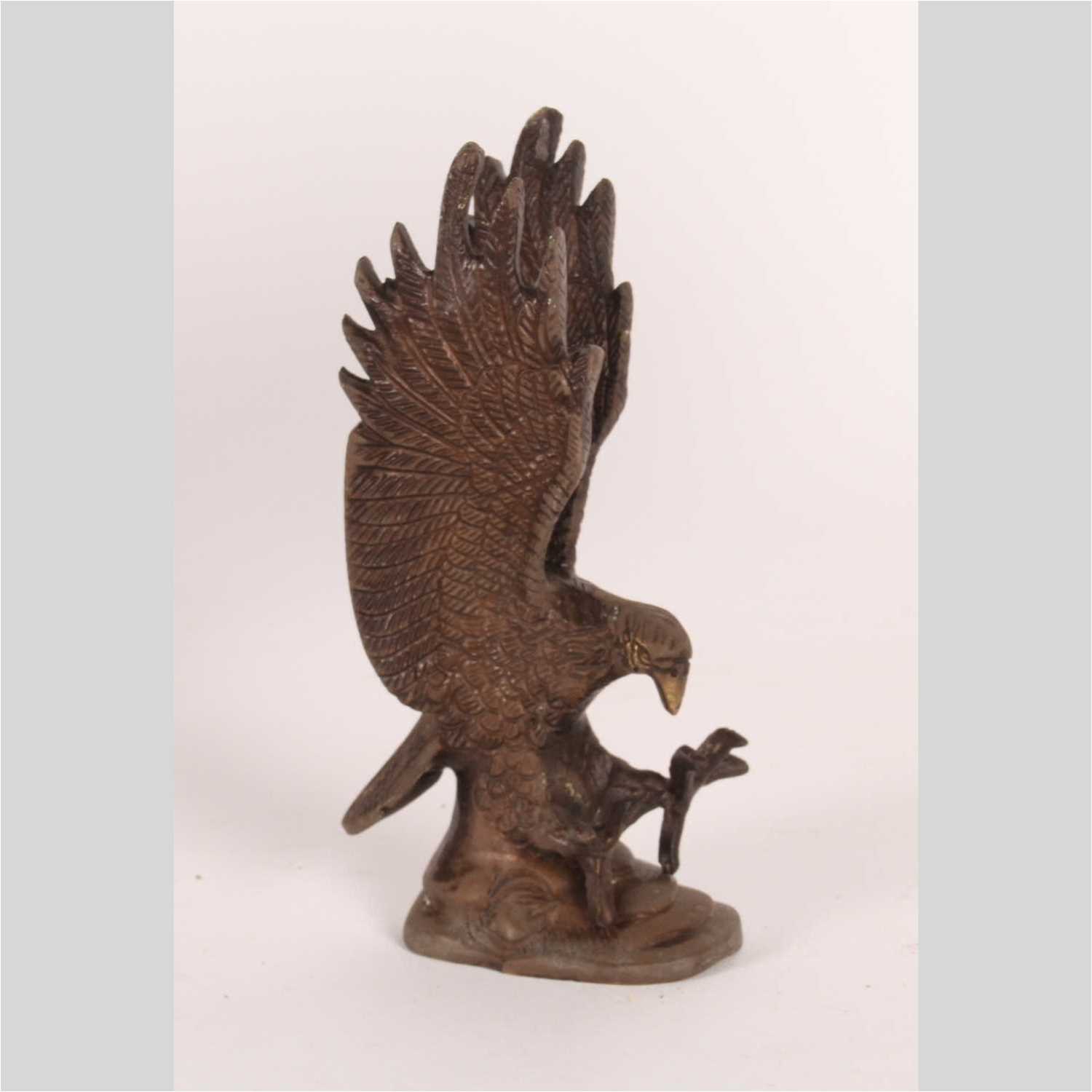 Lot 506 - A bronze alloy model of an eagle, shown in...