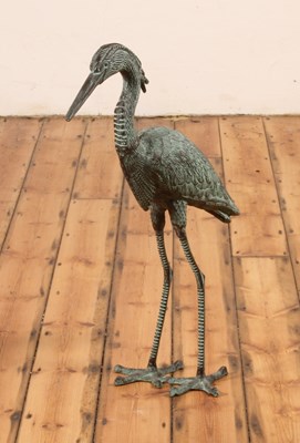 Lot 135 - A large cast metal garden sculpture of a heron,...