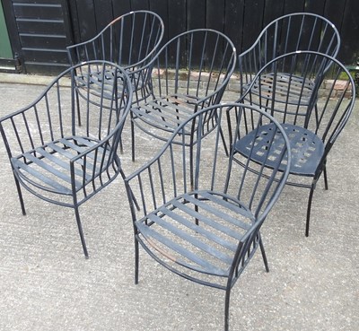 Lot 381 - A set of six black painted metal garden chairs