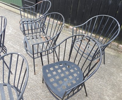 Lot 381 - A set of six black painted metal garden chairs