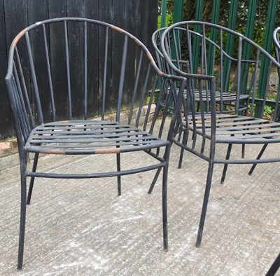 Lot 381 - A set of six black painted metal garden chairs