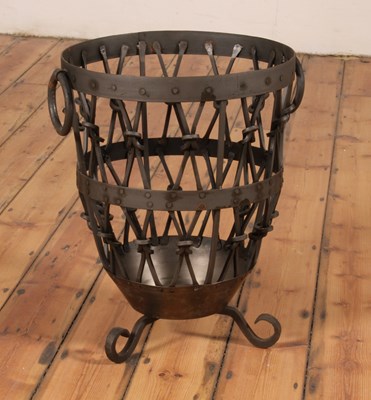 Lot 461 - A large wrought iron log basket, h.61cm