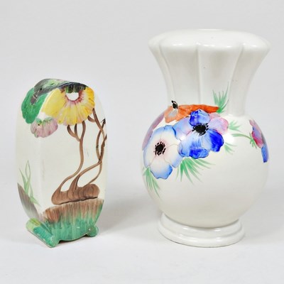 Lot 92 - A Clarice Cliff sugar caster, decorated in the...