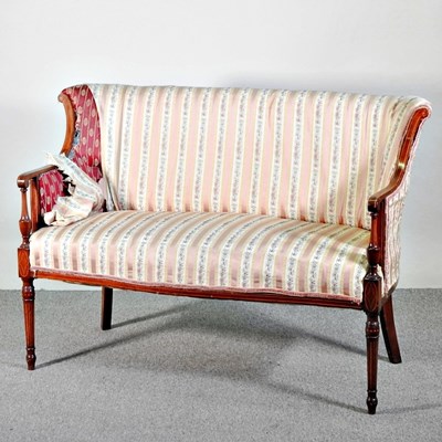 Lot 242 - An Edwardian striped upholstered sofa, on...