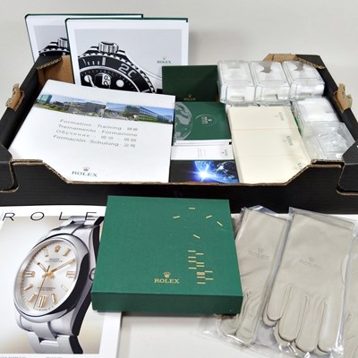 Lot 301 - A collection of Rolex related display items,...