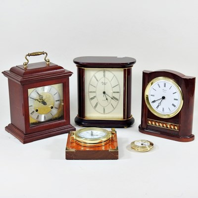 Lot 531 - A modern mantel clock, 23cm high, together...