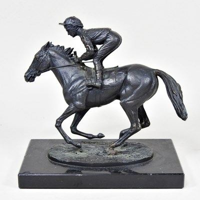 Lot 118 - A bronze model of a jockey on a racehorse,...