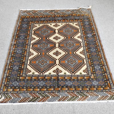 Lot 465 - A bokhara rug, with two rows of medallions,...