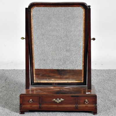 Lot 563 - A George III mahogany swing framed toiletry...