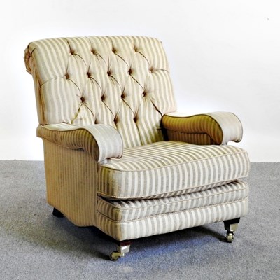 Lot 470 - A modern gold striped upholstered armchair, on...