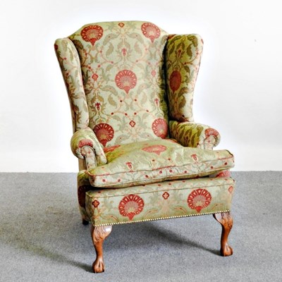 Lot 280 - A George I style floral upholstered wing...