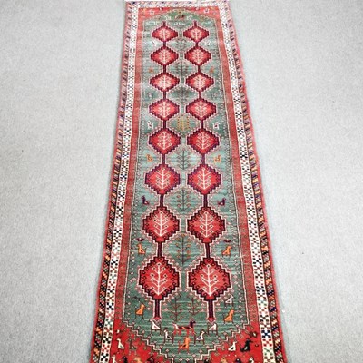 Lot 224 - A Persian yallemah runner, with two rows of...