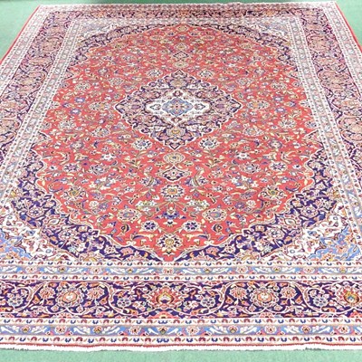 Lot 487 - A Persian kashan carpet, with all over foliate...