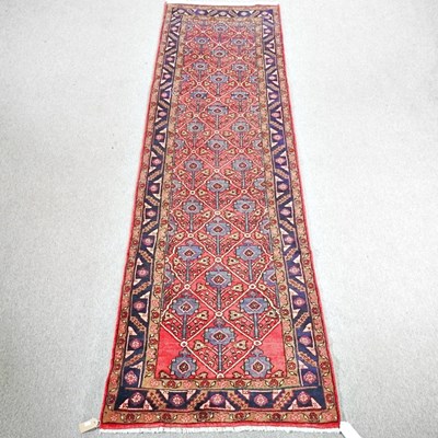 Lot 162 - A Persian sarab runner, with blue flowerhead...