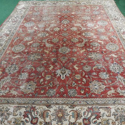 Lot 344 - A large woollen carpet