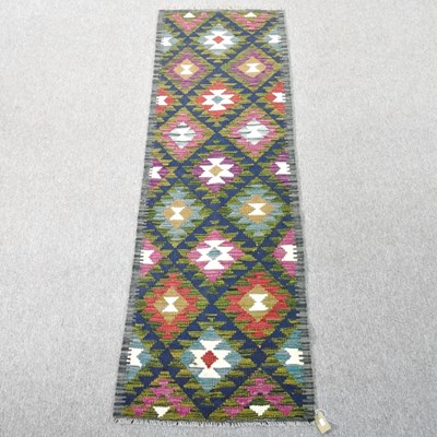 Lot 72 - A Persian kilim runner, with coloured diamonds,...