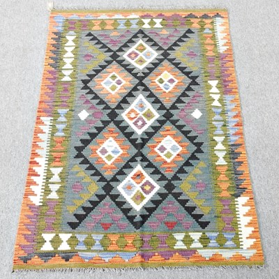 Lot 357 - A Persian kilim, with coloured diamonds, 153 x...