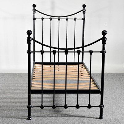 Lot 82 - A modern single black painted metal bedstead,...