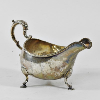 Lot 117 - A 19th century Irish silver sauce boat, of...