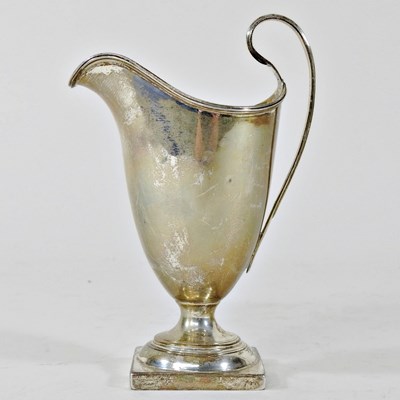 Lot 17 - A Victorian silver cream jug, of pedestal form,...