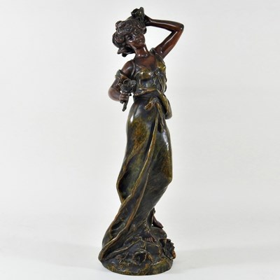 Lot 12 - An Art Nouveau style bronzed figure of a lady,...