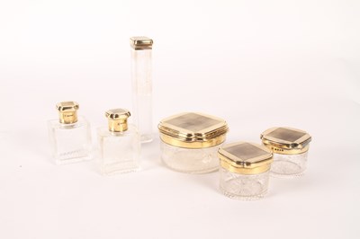 Lot 456 - An Art Deco gilt silver lidded set of glass...