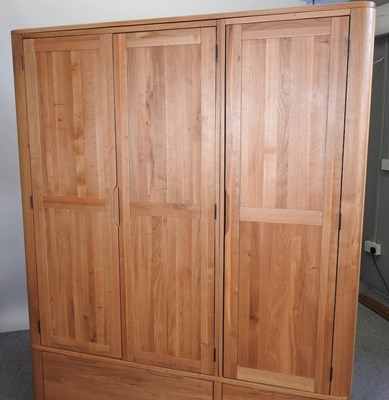 Lot 490 - A modern light oak wardrobe