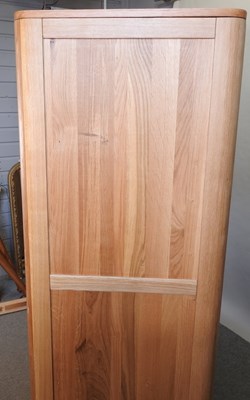 Lot 490 - A modern light oak wardrobe