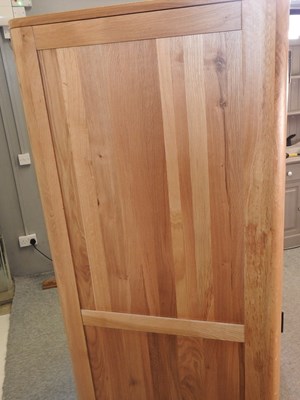 Lot 490 - A modern light oak wardrobe