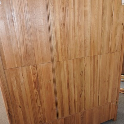 Lot 490 - A modern light oak wardrobe