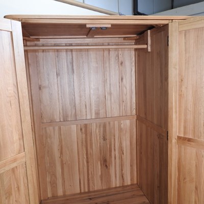 Lot 490 - A modern light oak wardrobe