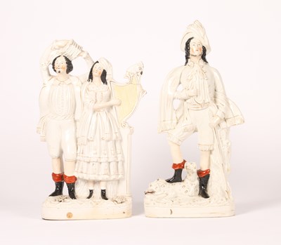 Lot 201 - Two Victorian Staffordshire pottery figures,...