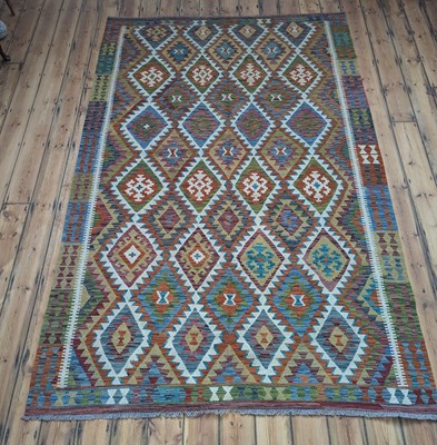 Lot 109 - A Turkish kilim carpet, with colourful...