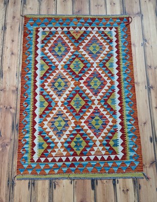 Lot 471 - An Afghan Chobi kilim rug, with colourful...